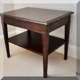 F38. Tiered side table. 